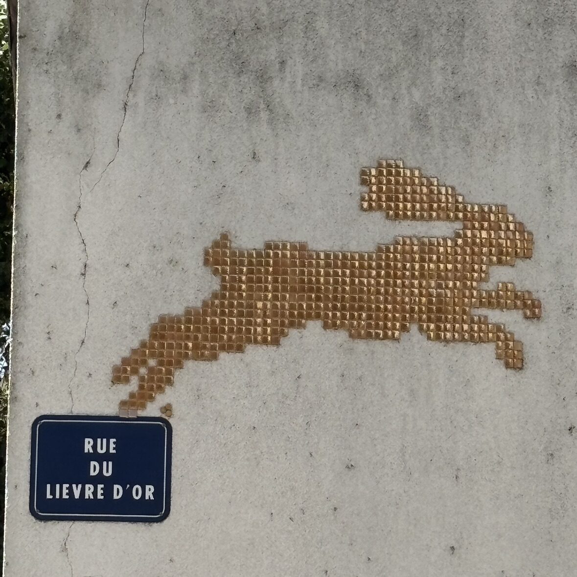 The Golden Hare in Gilded Tesserae — Street art by Mifamosa in Orléans