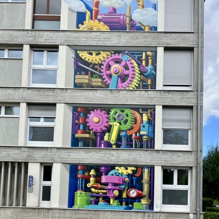 Wish Maker, la machinerie colorée — Street art de Leon Keer à Le Locle