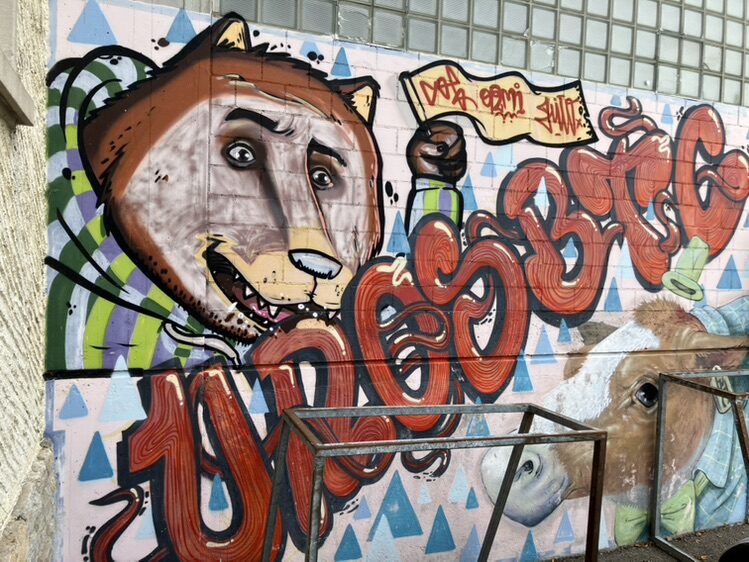 The Dog and the Calf, by BTC — Street art in La Chaux-de-Fonds