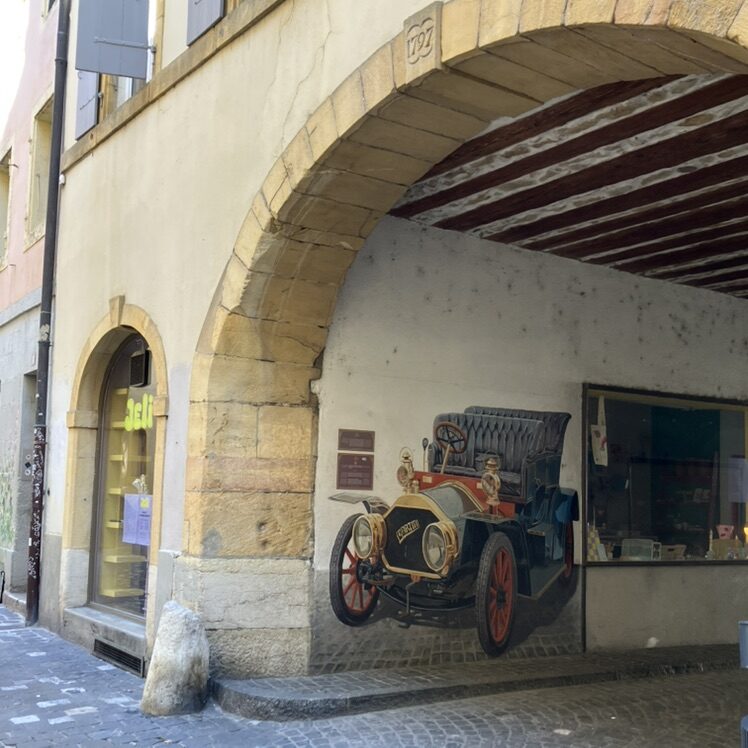 Vintage Car under the Archway — Street art in Neuchâtel