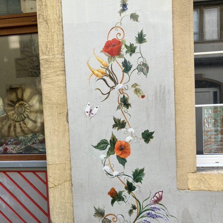 Triton au ventre orange — Street art à Neuchâtel
