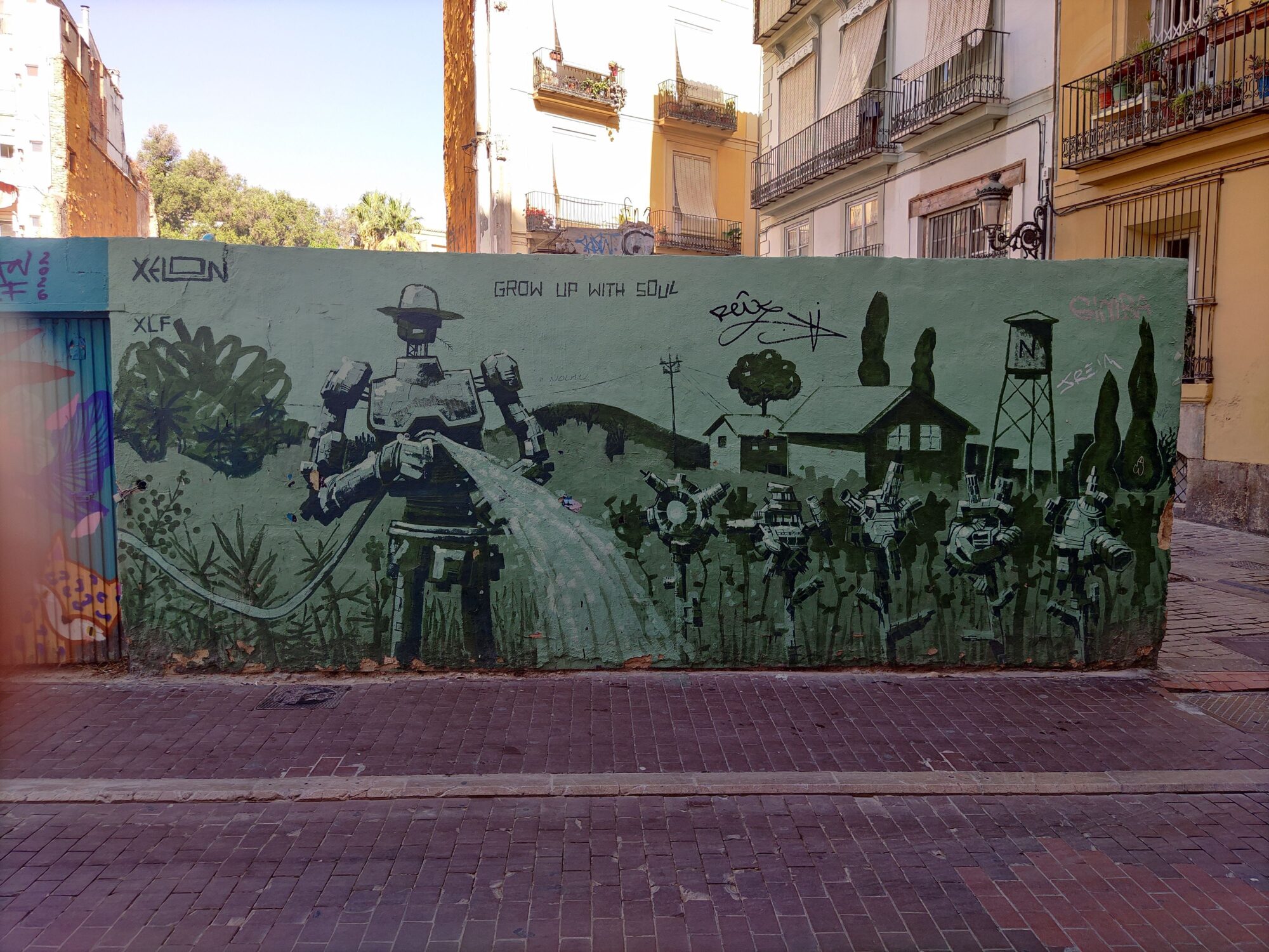 Grow Up With Soul, the Robot Gardener — Street art by Xelon xlf in València