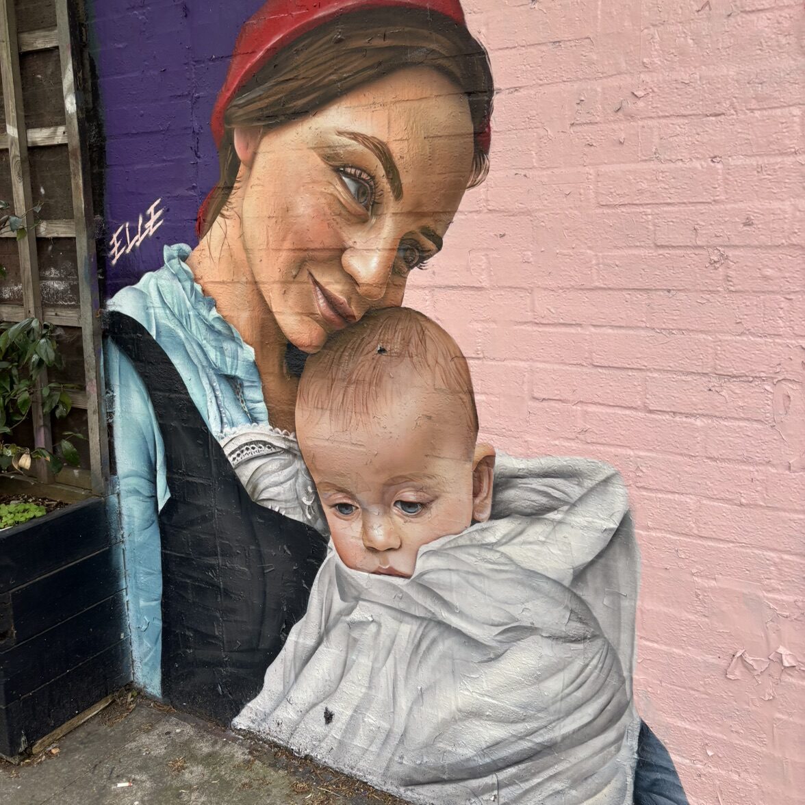 Mother and Child in a Sling — Street art by Elle Koziupa in London