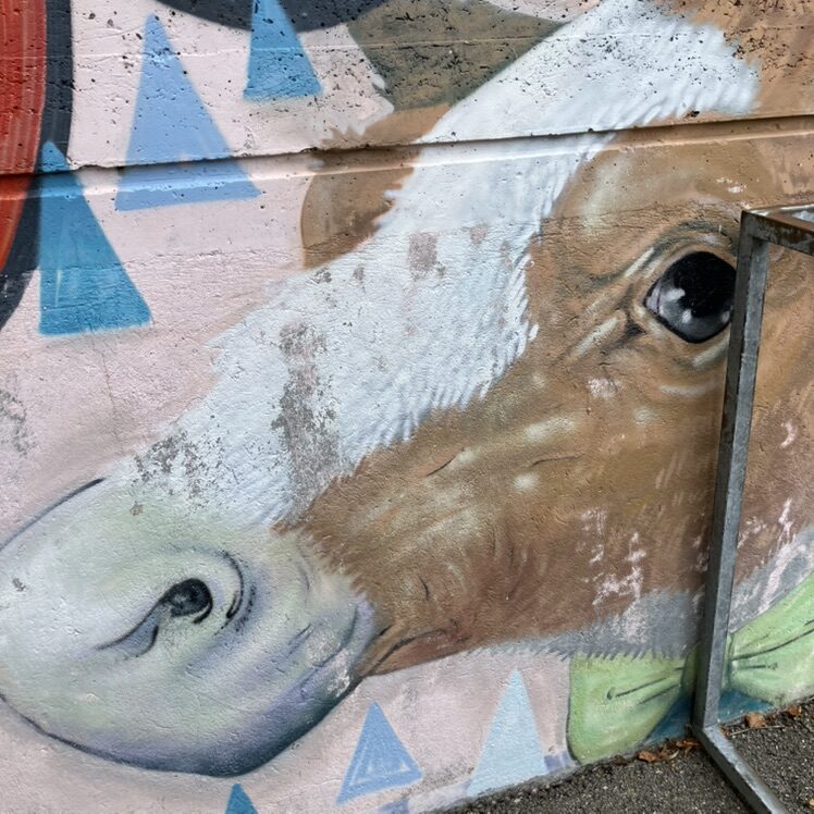 The Dog and the Calf, by BTC — Street art in La Chaux-de-Fonds