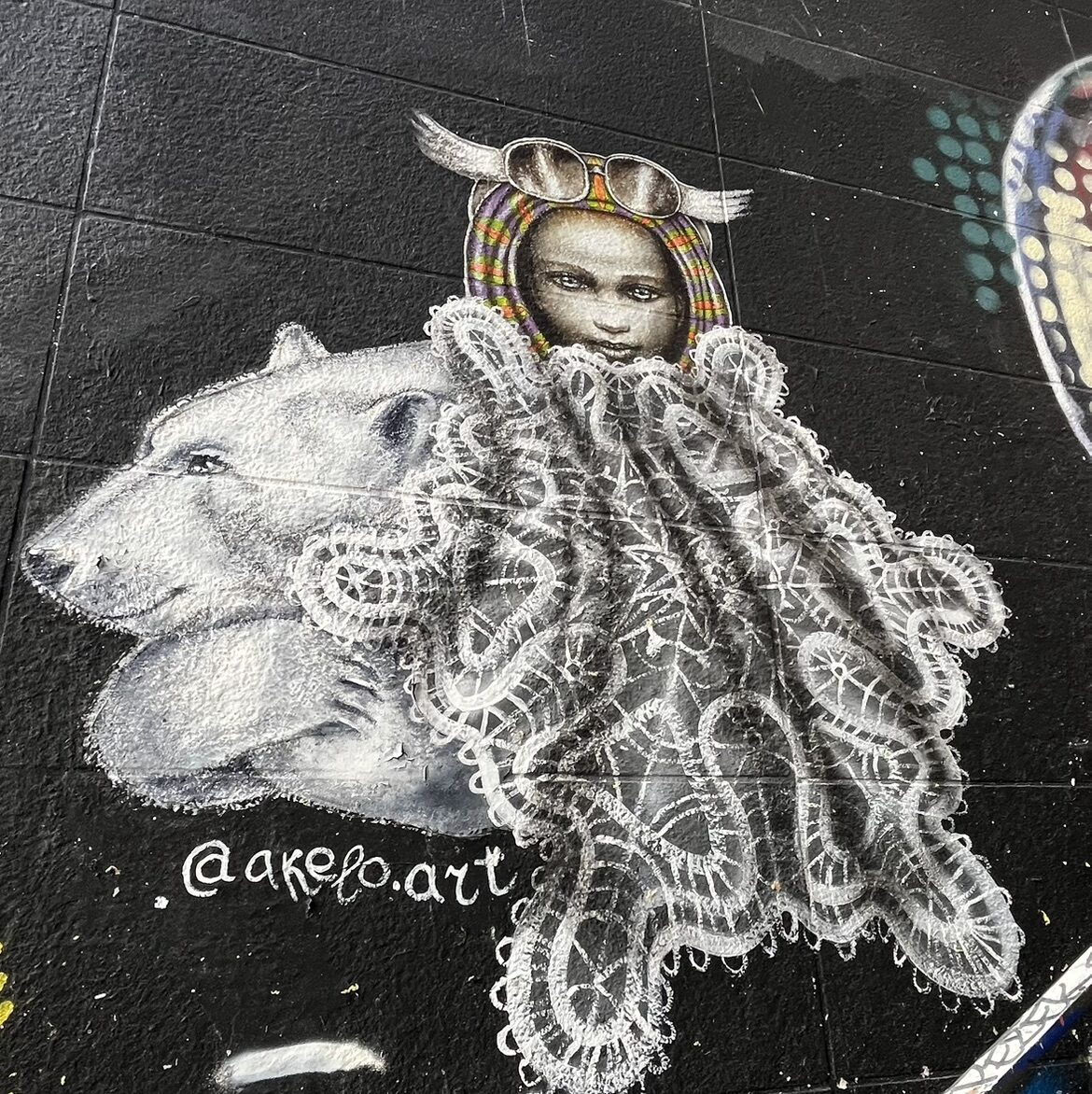 The Aviatrix and the Polar Bear by Akelo — Street art by Akelo in Paris