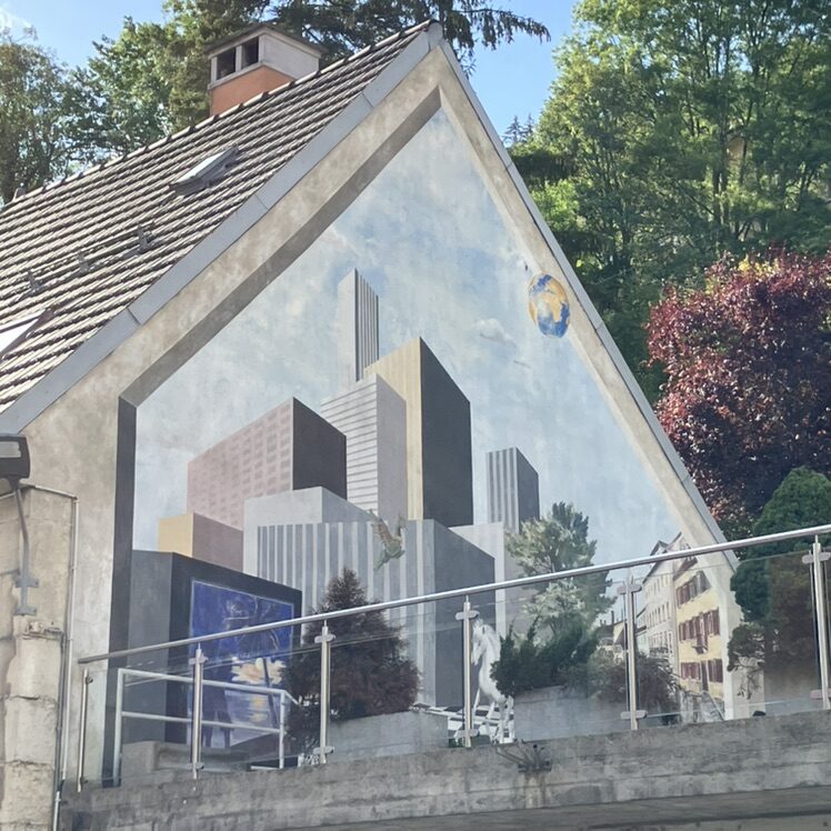 Skyscrapers, dragon and white horse — Street art in Le Locle