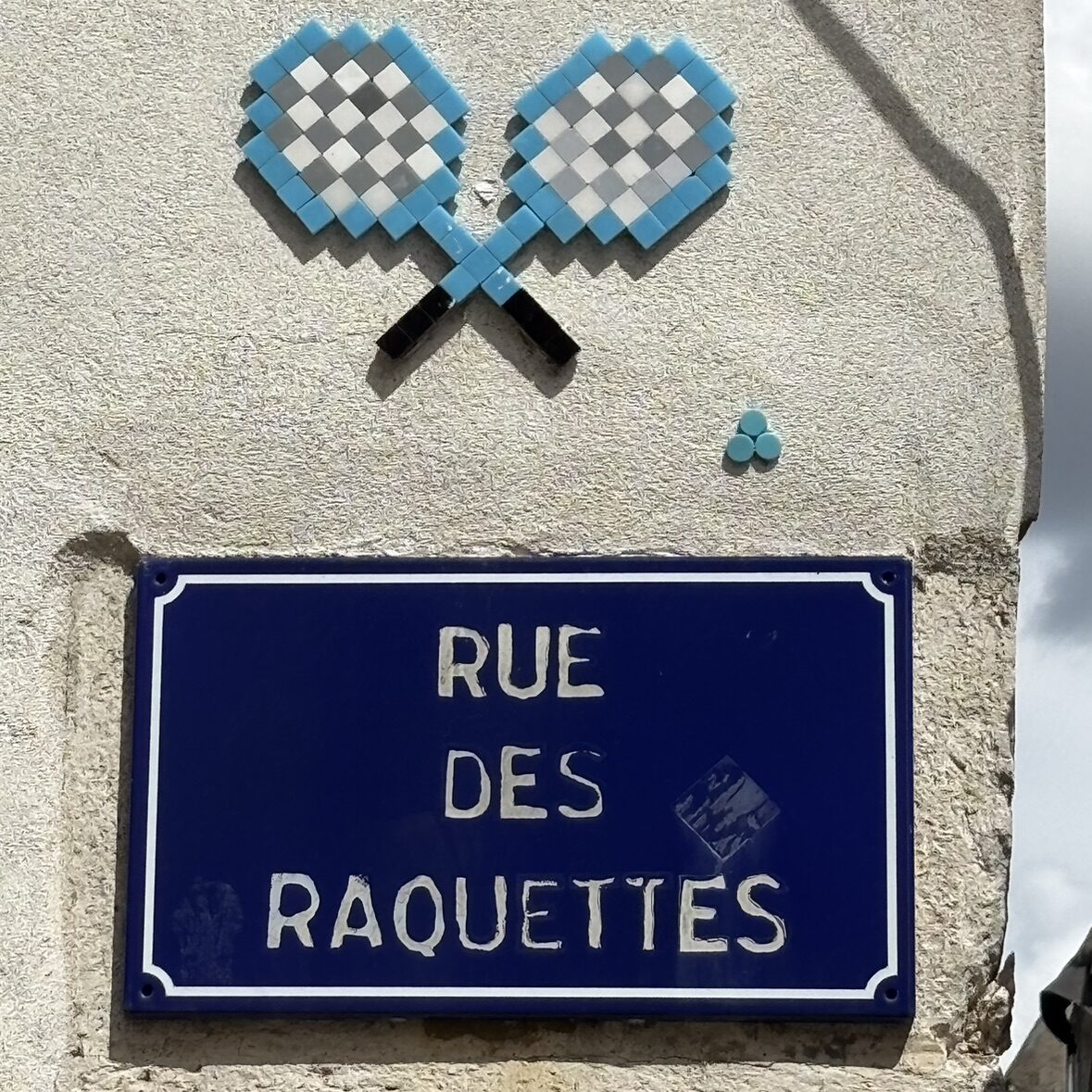 Two Crossed Rackets — Street art by Mifamosa in Orléans
