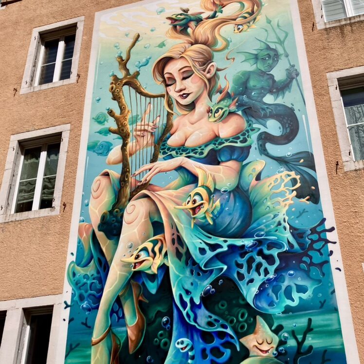 Agnès and the triton — Street art by Abys in Le Locle