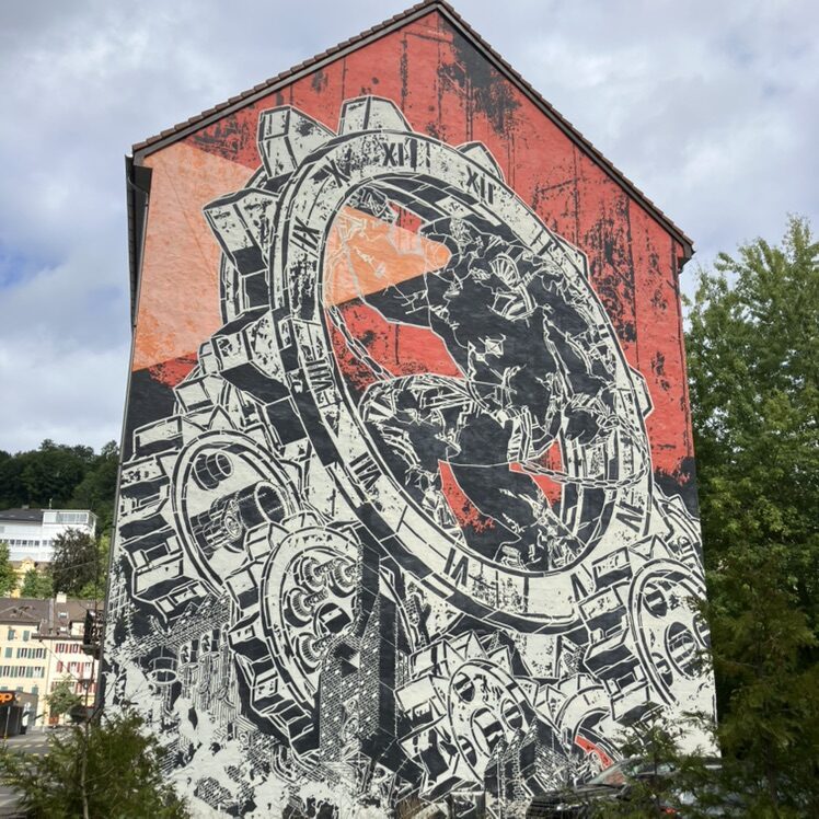 The Slaves of Time — Street art by M-CITY in Le Locle
