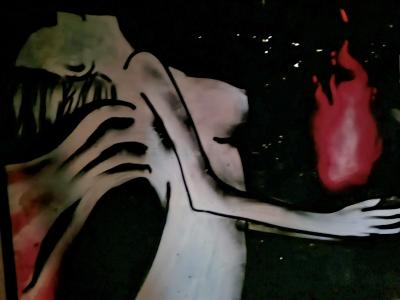 The Gaunt Figure and the Flame — Street art in Grenoble