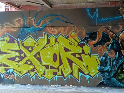 Exor Graffiti with Fantastic Characters, Berlin — Street art by Rogge Das Fell in Berlin