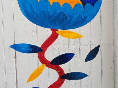 Blue Flower with Twisted Red Stem — Street art in Nantes