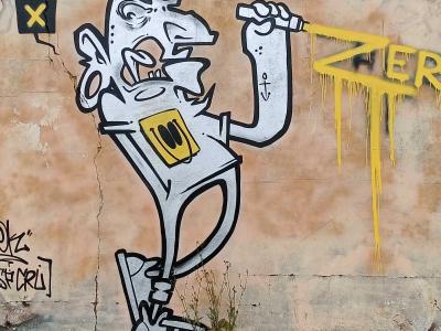 Cartoon Character with Yellow Spray — Street art in Redon