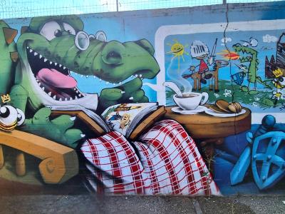The Crocodile in Bed — Street art in Vallon-Pont-d'Arc