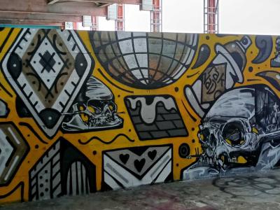 Skulls and Tribal Patterns on Golden Background — Street art by Chervi.1 in Berlin