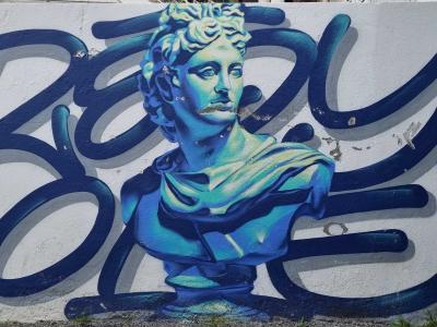 Neoclassical Bust and Blue Lettering, by Reg One — Street art in Vichy