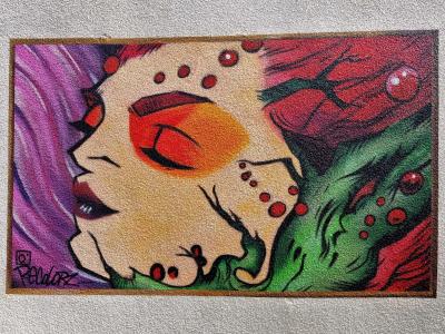 The Face with the Orange Eye — Street art in Clermont-Ferrand