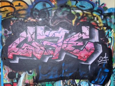 Pink lettering on a black cloud — Street art in Grenoble