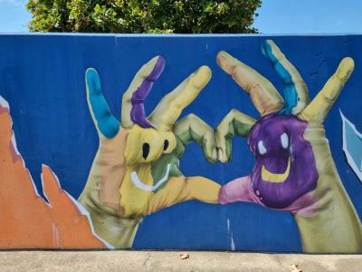 The Face-Hands Forming a Heart — Street art in Vallon-Pont-d'Arc