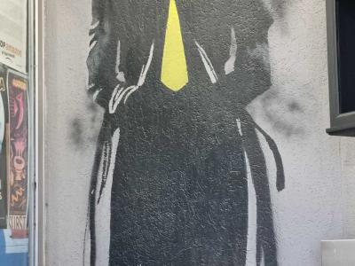 Detective Silhouette with Tie — Street art in Strasbourg