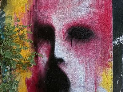 The Pink Face with Black Blots — Street art by Godelu in Nantes