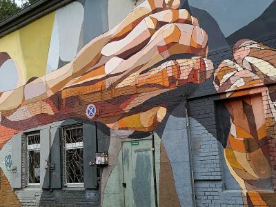 Intertwined Hands by Lake Oner — Street art by Lake Oner in Berlin