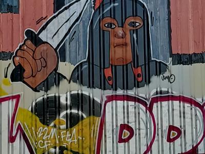 Guerrier au couteau signé JuM — Street art à Rennes