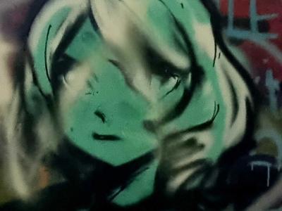 Green Face with Lowered Gaze — Street art in Grenoble