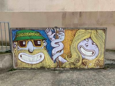 Two Faces with Yellow Hair — Street art in Belfort