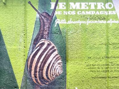 Snail and Countryside Metro Slogan — Street art in Grenoble