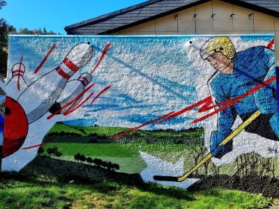 Hockeyeur et quilles au Mont-Dore — Street art à Mont-Dore