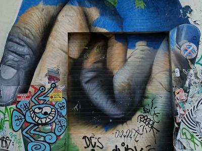 Giant Hand Trompe-l'Oeil on Door — Street art by MATE in Berlin