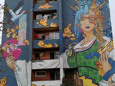 Golden woman in baroque ornament — Street art by Kipras Petrulis, Hiroyuki Mitsume Takahashi in Vilnius