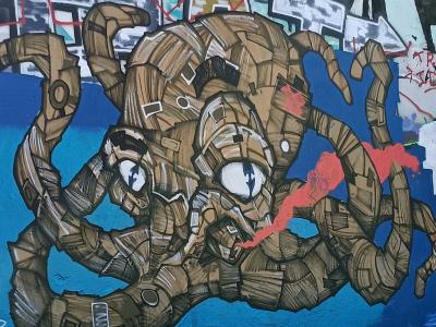Pieuvre mécanique sur fond bleu — Street art à Nantes
