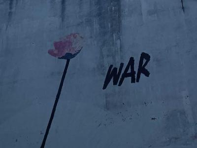 Poppy and WAR Word by War — Street art by War in Rennes