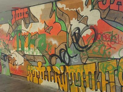 Tunnel Covered with Layered Graffiti — Street art in Prague