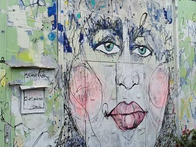 Expressive Portrait with Green Eyes — Street art by Paula Marie in Berlin