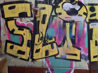 Yellow Letters and Character — Street art in Grenoble
