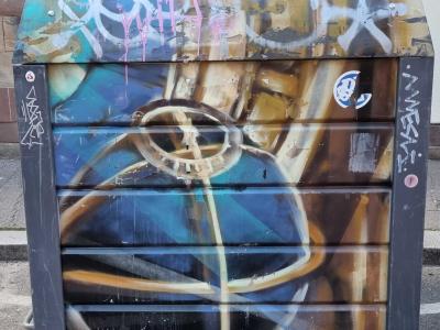Golden Ribbons and Toothed Ring — Street art in Strasbourg