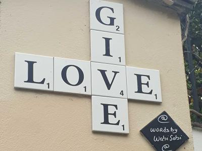 Give Love in Scrabble Tiles — Street art in Paris