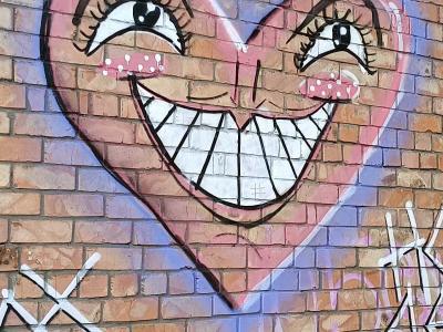 Smiling Heart on Brick Wall 2022 — Street art in Rīga