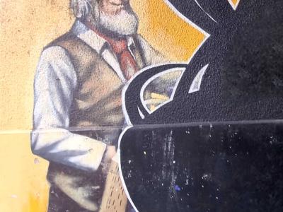 Bearded Old Man Reading a Newspaper — Street art in Grenoble