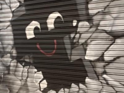 Smiling Ghost Flying Tiger — Street art in Madrid