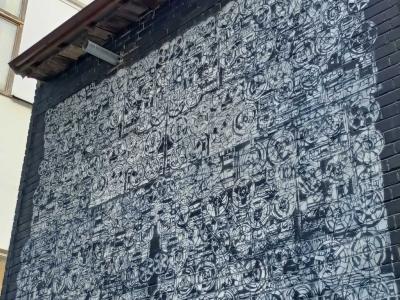Densely detailed monochrome patterns — Street art by Olivier Hölzl in Vilnius