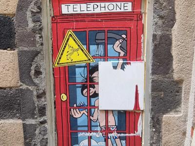 Sticker Art on Phone Box — Street art in Clermont-Ferrand