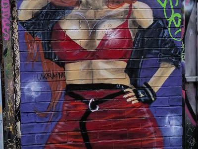 The Redhead in Red, Calvin Street — Street art in London