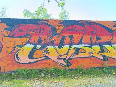 Le personnage-livre rouge — Street art de Aucre (Ocre) à Nantes