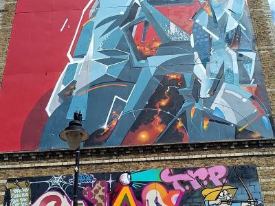 Geometric Robot Face-Off — Street art in London