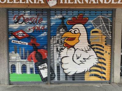 Rooster and Madrid Landmarks — Street art in Madrid