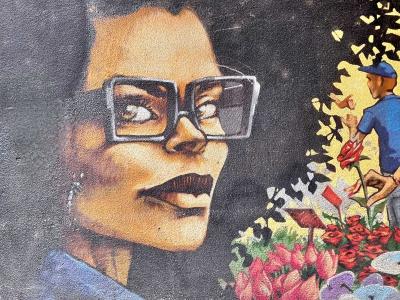 Portrait of Woman with Glasses and Flowers — Street art in Grenoble